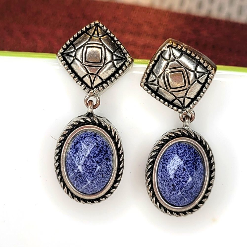 Beautiful silver tone and blue stone earrings.